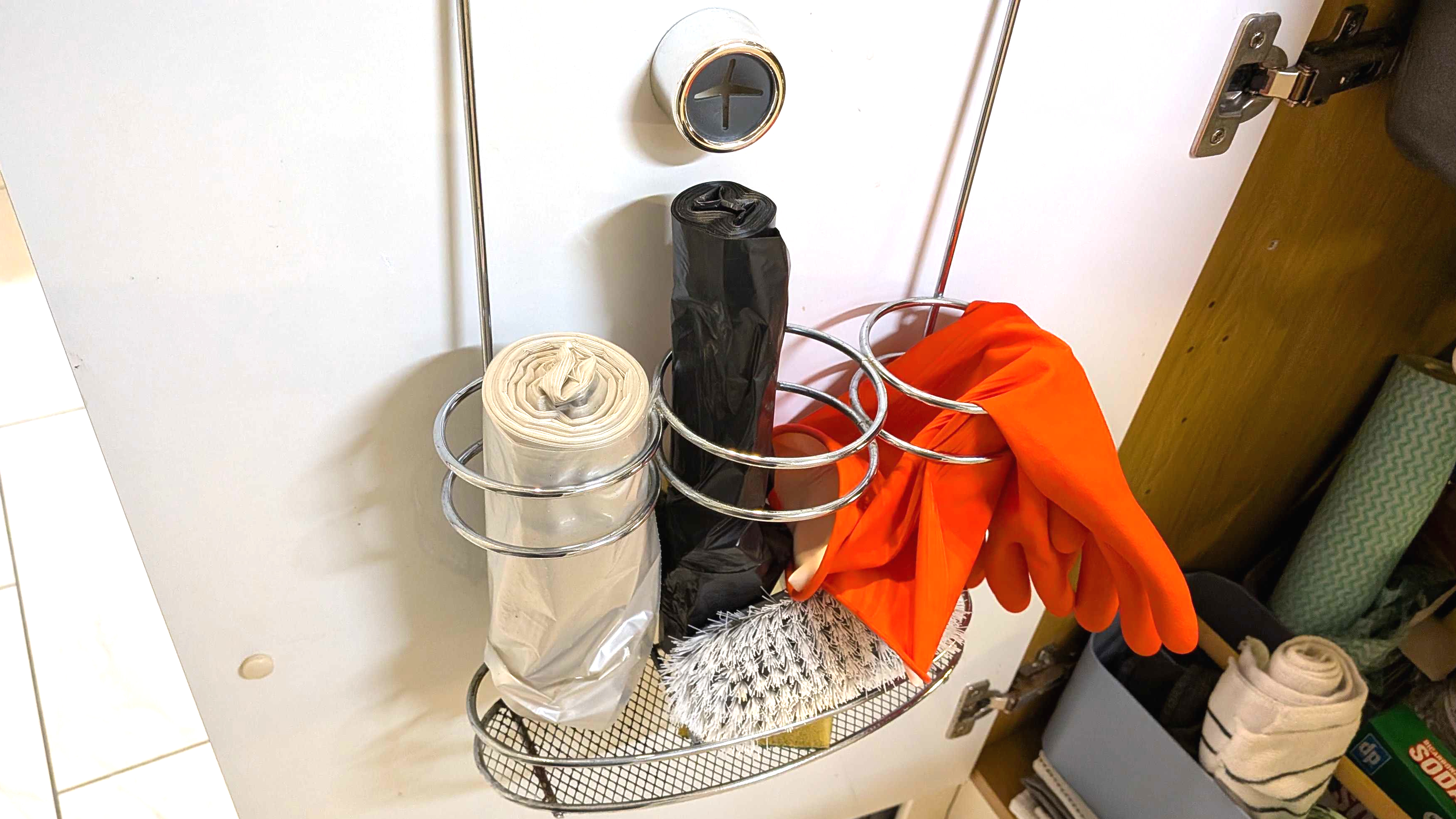 Shower caddy inside kitchen cabinet