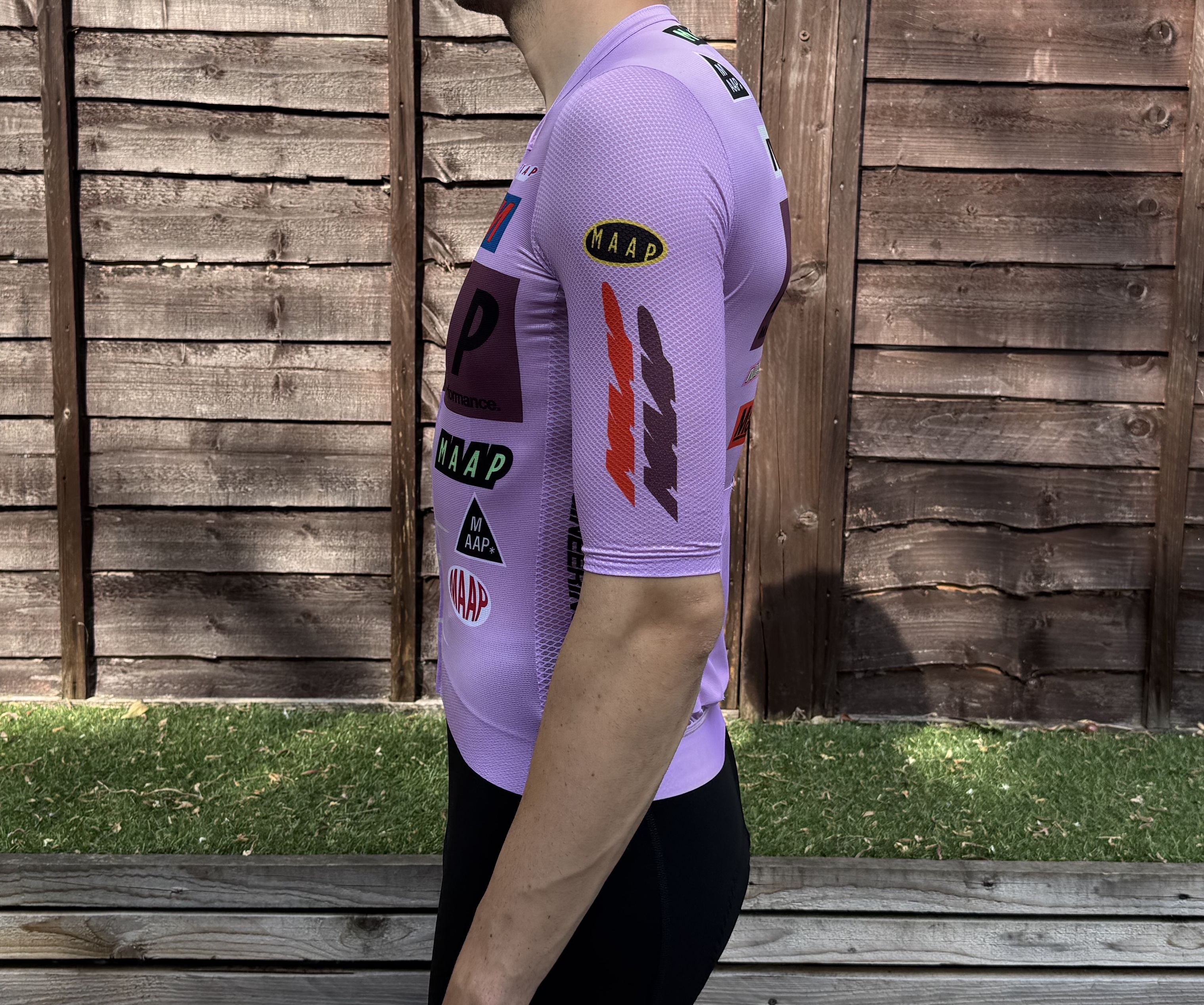 The sleeves grip well even without silicone grippers, but come down quite far for a summer jersey