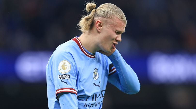 Manchester City striker Erling Haaland holds his head during his side&#039;s 3-1 win over Aston Villa in the Premier League in February 2023.