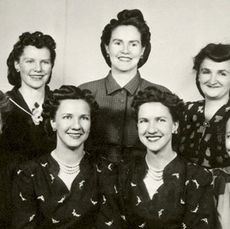 black and white photo of seven polygamous wives in the 1950s