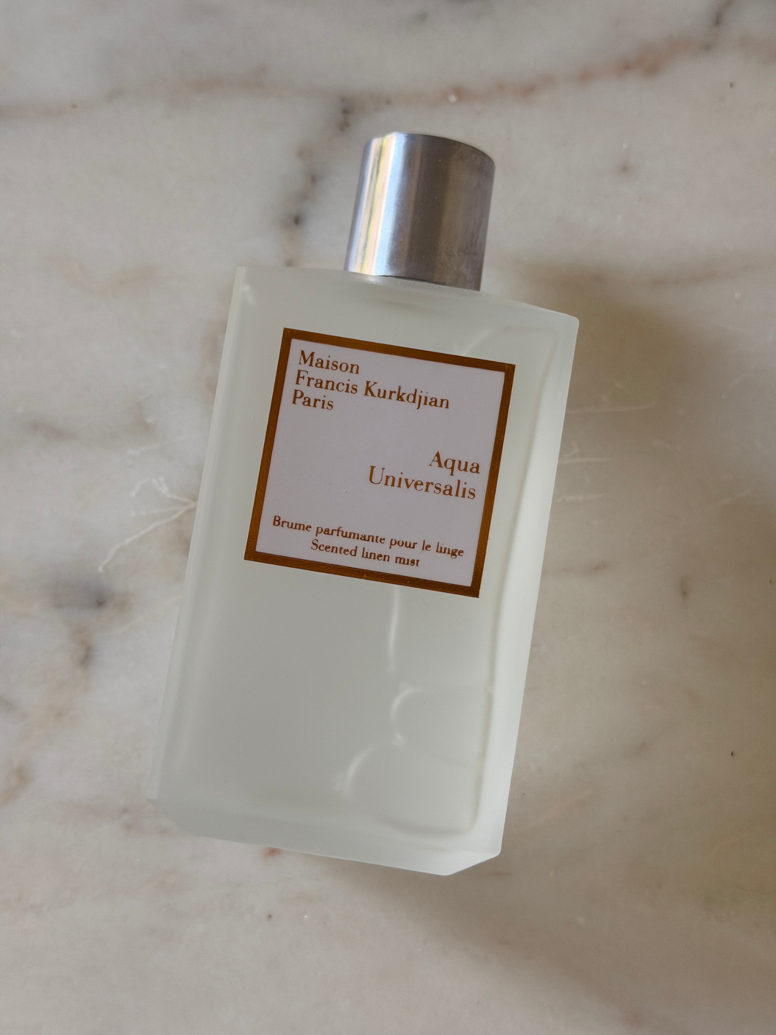 A bottle of Maison Francis Kurkdjian Aqua Universalis Linen Mist