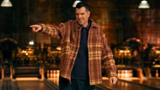Timothy Simons smiling and pointing with his left hand in Nobody Wants This. 
