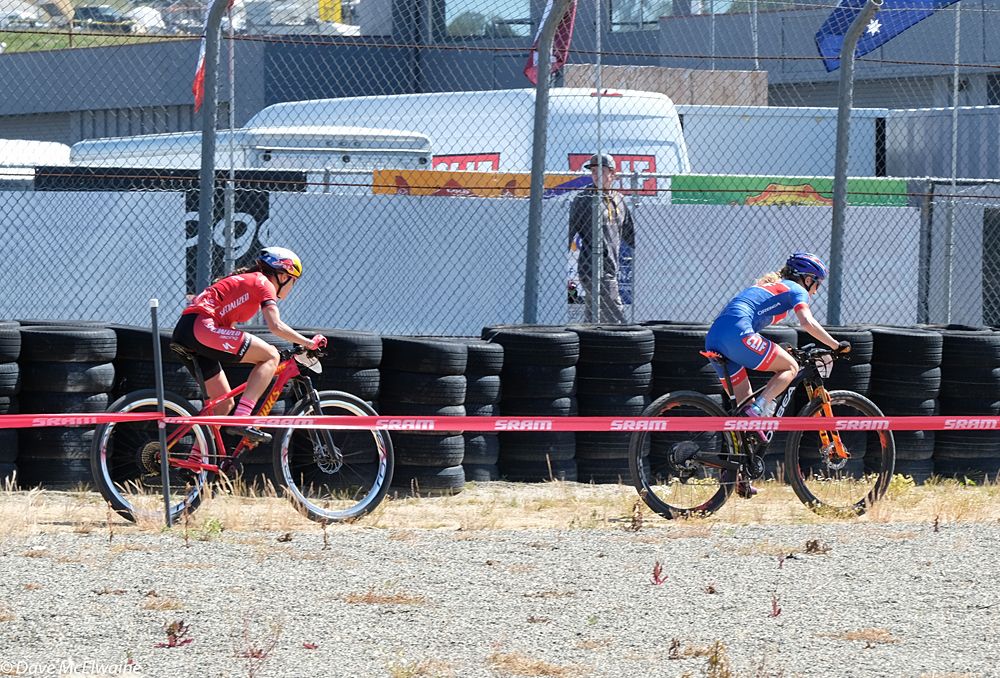 Catharine Pendrel (Clif Pro Team) leading Kate Courtney (Specialized) during lap three