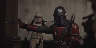 Pedro Pascal in armor with Stormtrooper The Mandalorian disney+