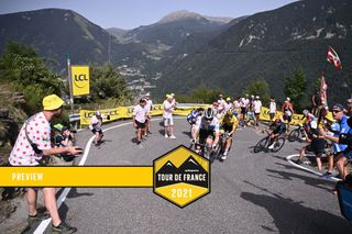 Team Jumbo Visma's Jonas Vingegaard of Denmark rides ahead of Team UAE Emirates' Tadej Pogacar of Slovenia during the 15th stage of the 108th edition of the Tour de France cycling race, 191 km between Ceret and Andorre-La-Vieille, on July 11, 2021. (Photo by Anne-Christine POUJOULAT / AFP) (Photo by ANNE-CHRISTINE POUJOULAT/AFP via Getty Images)