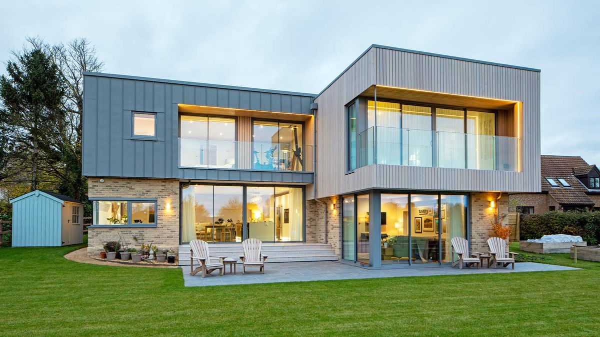 Contemporary rectangular self build with projecting first floor with a balcony