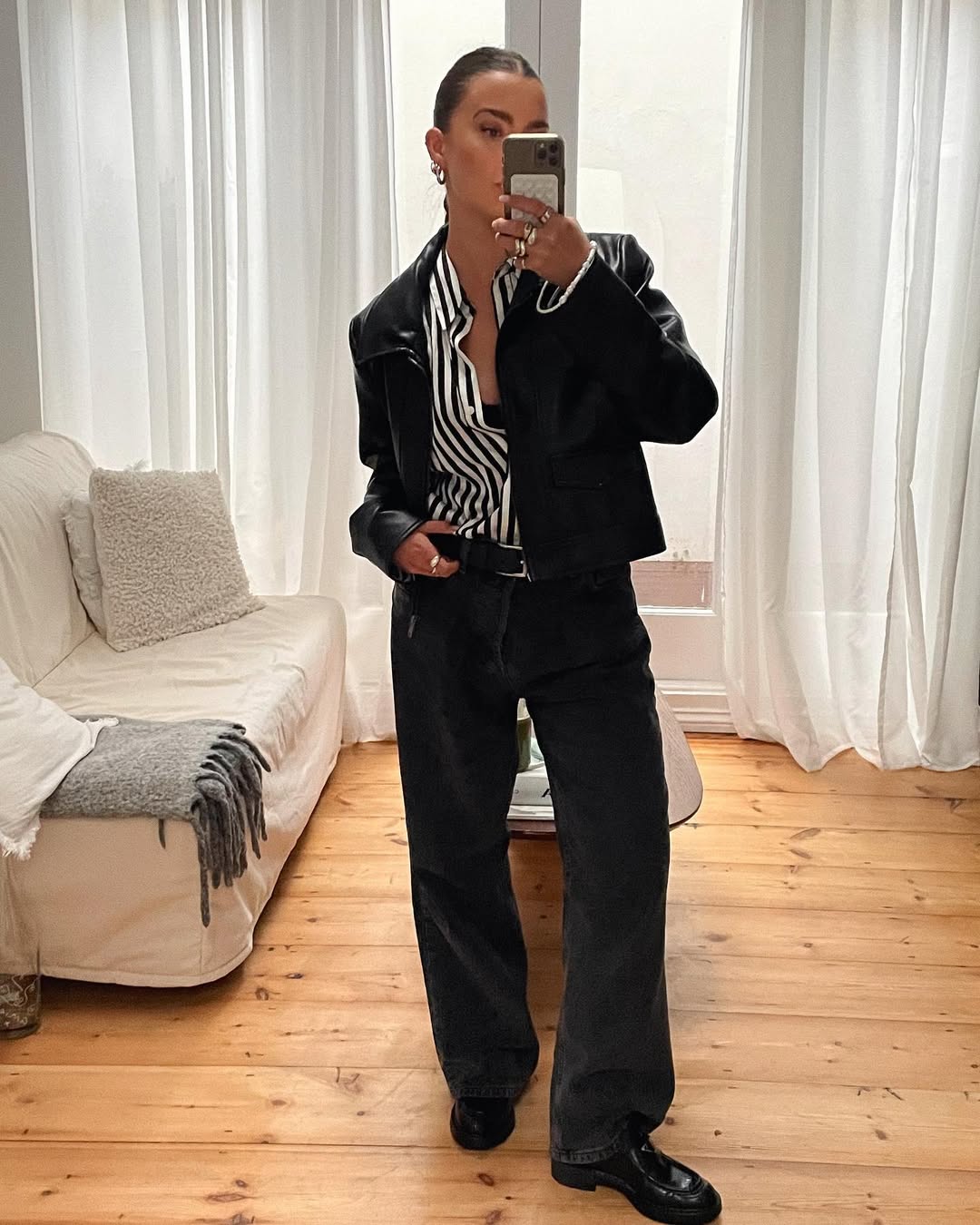 Woman wearing loafers with jeans outfit 2025.