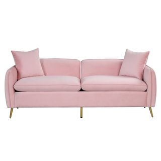A light pink velvet couch