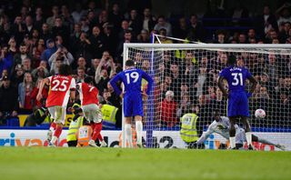 Arsenal’s Bukayo Saka scores his sides fourth goal during the Premier League match at Stamford Bridge, London. Picture date: Wednesday April 20, 2022