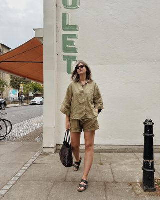 Woman on street wearing matching linen set