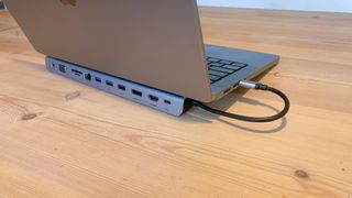 Belkin Connect USB-C 11-in-1 Multiport Dock on a wooden surface