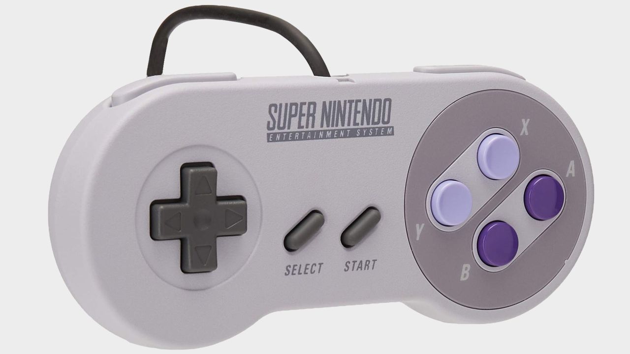 SNES mini controller with grey backdrop.