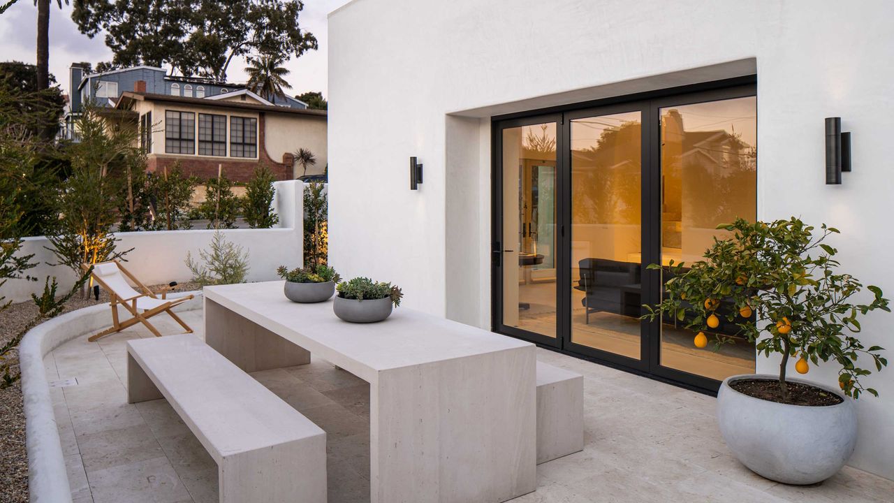 a minimalist patio in a backyard