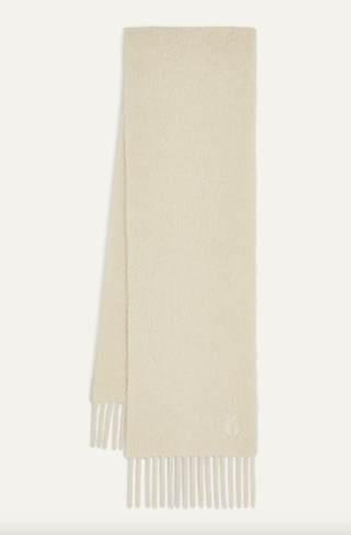 a cream scarf from bash in front of a plain backdrop