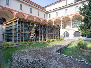Cloister in Milanese Palazzo with architectural installation