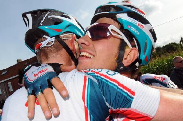 Adam Blythe celebrates his victory with his Omega Pharma - Lotto teammates.