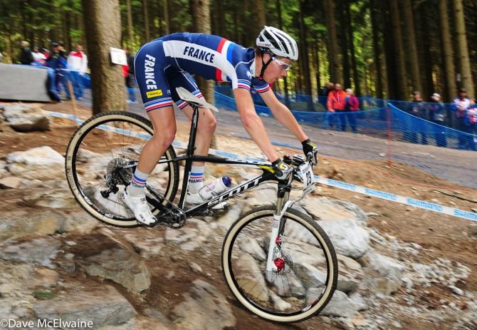 Lucas Dubau (France) riding a vertical drop