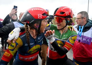 Lidl-Trek's Shirin van Anrooij and Elisa Longo Borghini celebrate their podium placings at the Tour of Flanders