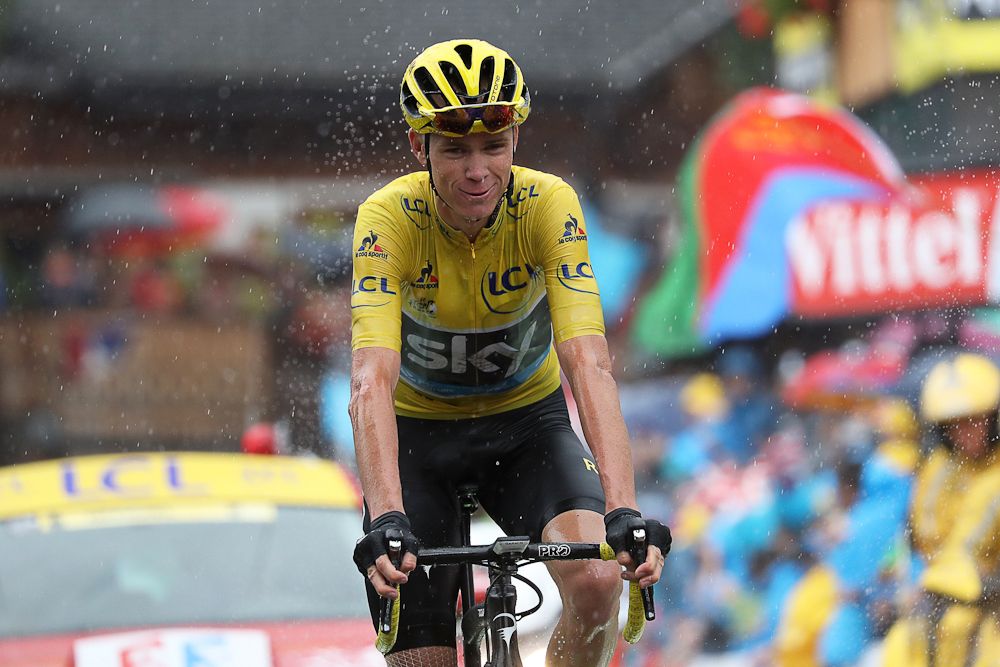 Chris Froome crosses the finish line of stage 20 at the Tour de France