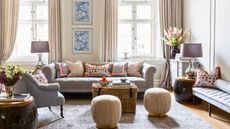 living room with gray sofa and patterned cushions