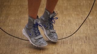 Close up of someone skipping rope