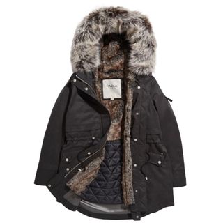 cut out of black parka with faux fur trim hood and inner lining