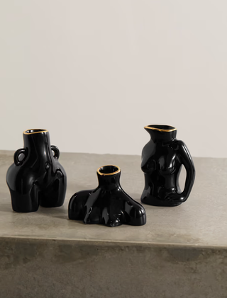 three bodyform vases with gold-plated rims