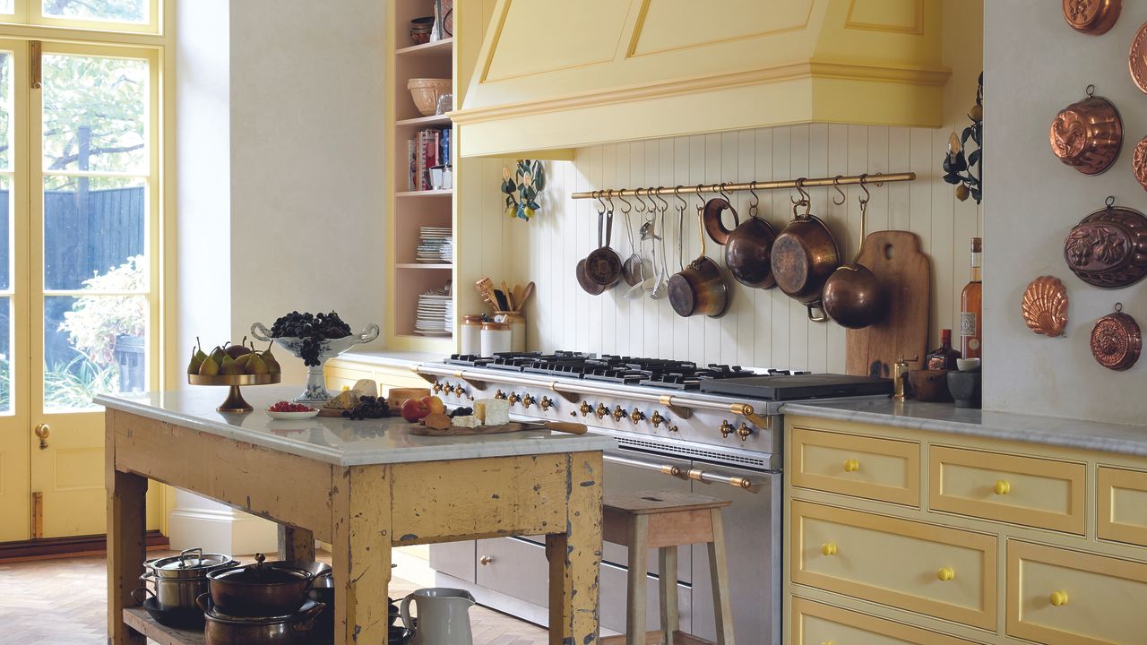 Butter yellow kitchen with shaker doors