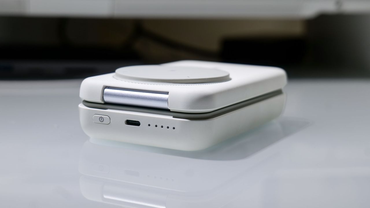 Rorry 3-in-1 Portable 10000 mAh Charger on desk.
