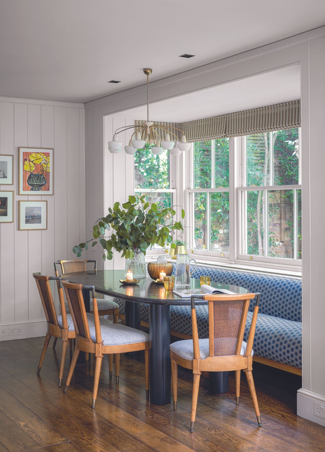 dining table with booth seating in bay window