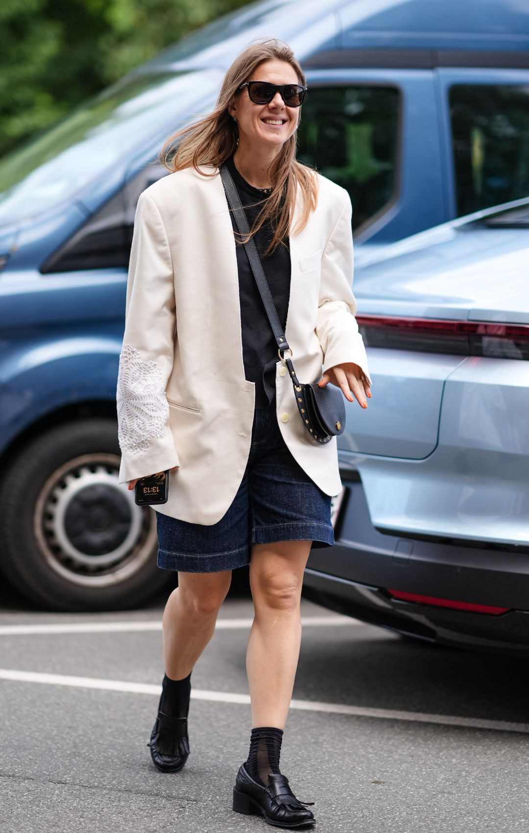 Image of woman wearing socks with loafers
