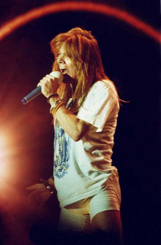 Axl Rose of Guns n' Roses performs on stage at Wembley Stadium on August 31st, 1991 in London, England