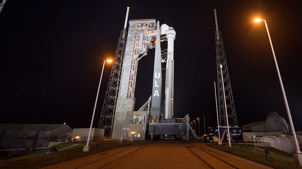 A United Launch Alliance Atlas V rocket with Boeing&rsquo;s CST-100 Starliner spacecraft onboard is seen illuminated by spotlights on the launch pad at Space Launch Complex 41 ahead of the Orbital Flight Test mission, Wednesday, Dec. 18, 2019 at Cape Canaveral Air Force Station in Florida.