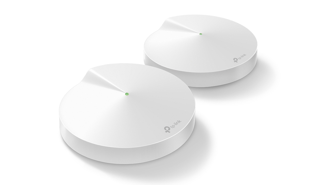 TP-Link Deco M9 against a white background