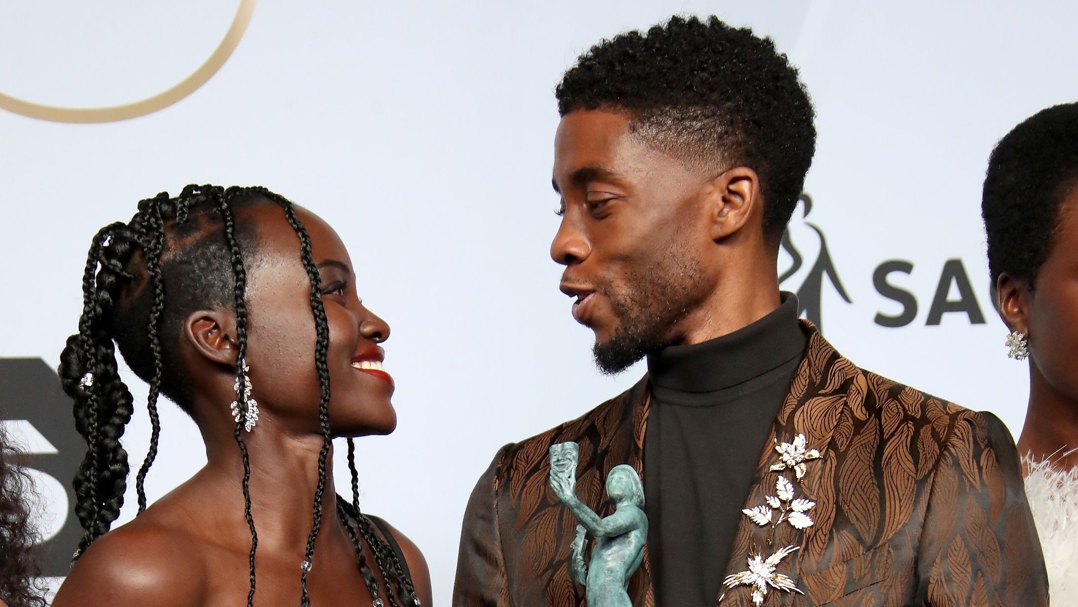 los angeles, ca january 27 lupita nyongo and chadwick boseman, winners of outstanding performance by a cast in a motion picture for black panther, pose in the press room during the 25th annual screen actors guild awards at the shrine auditorium on january 27, 2019 in los angeles, california photo by dan macmedangetty images