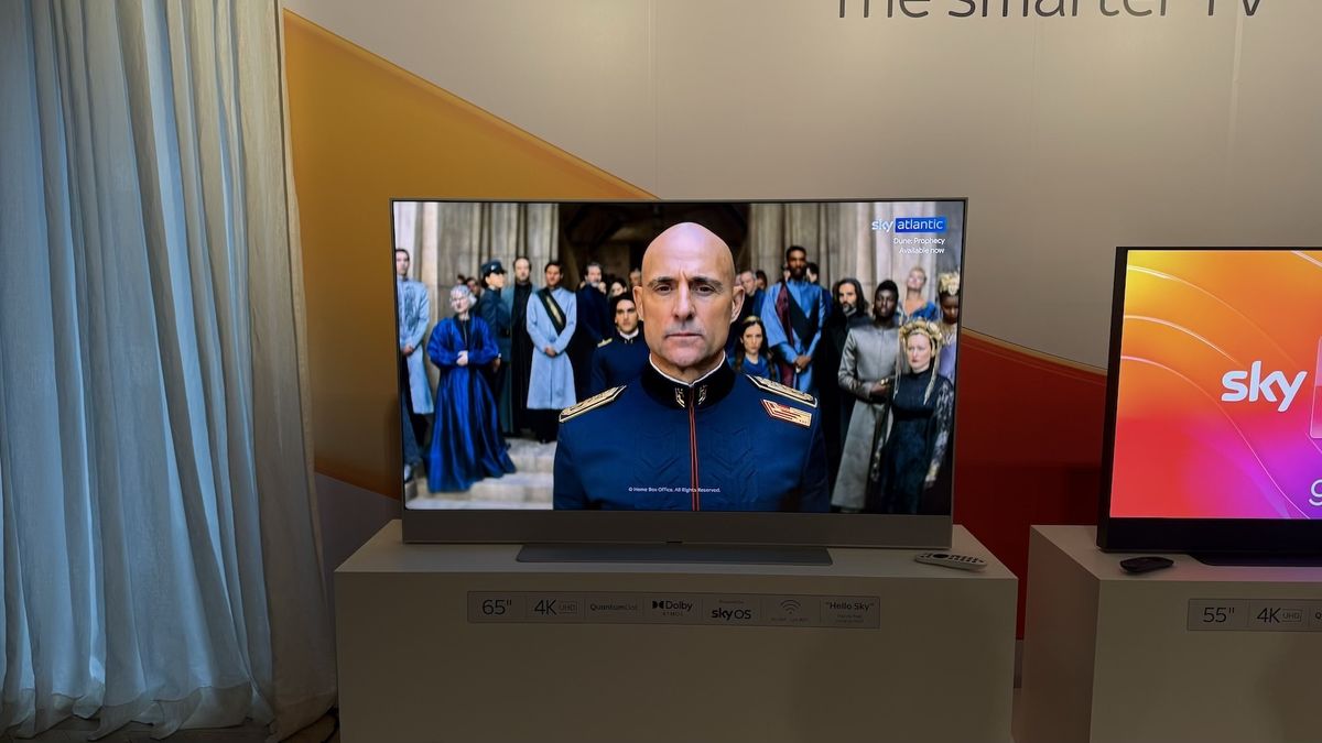 The Sky Glass TV pictured on a white stand at a launch event