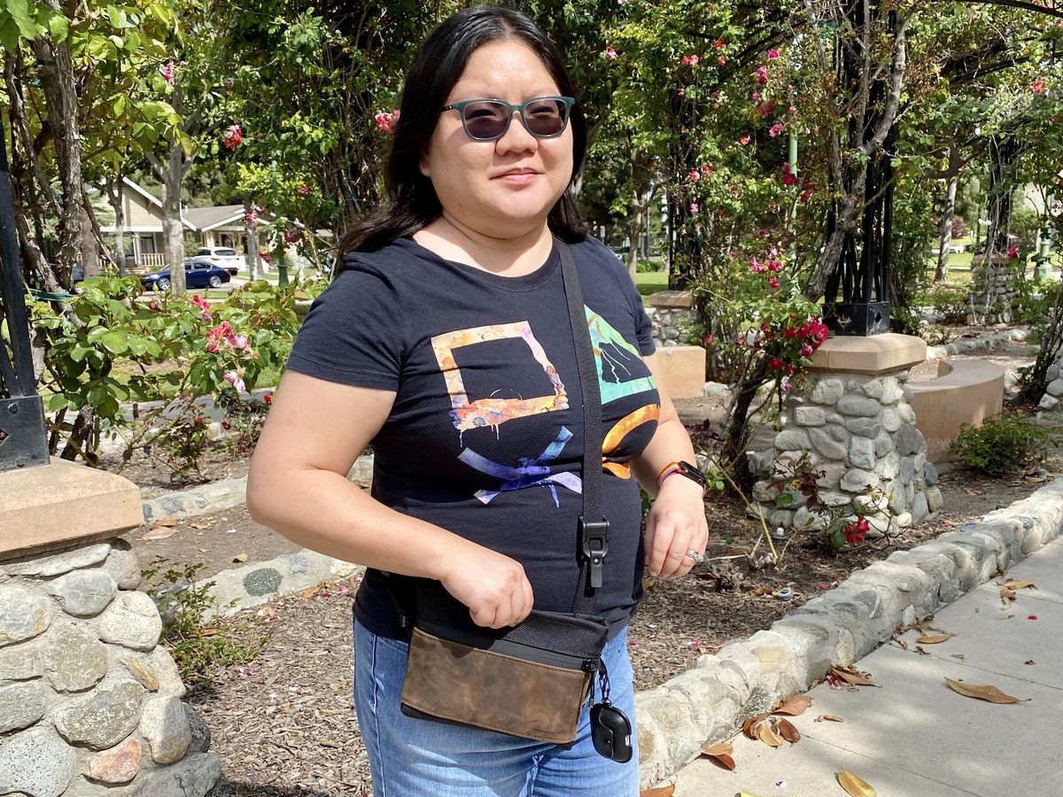 Christine Romero-Chan wearing the Waterfield Designs Marquis Crossbody Pouch