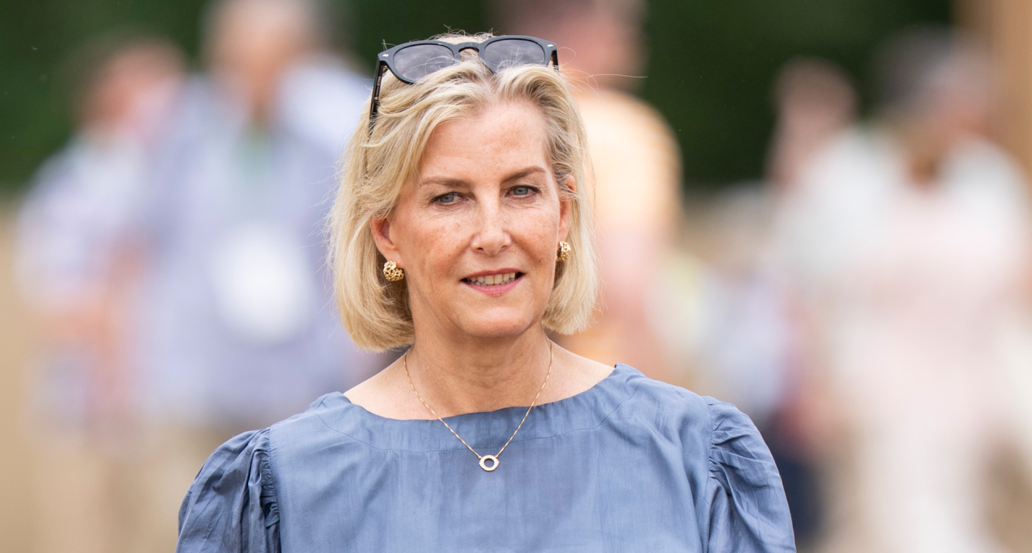 Duchess Sophie wearing a blue top and smiling