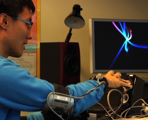 Graduate Student Johnty Wang demonstrates the gesture control system. 