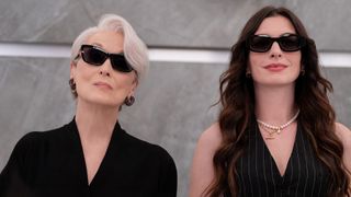 Miranda and Andy wearing sunglasses and half-looking up in The Devil Wears Prada 2