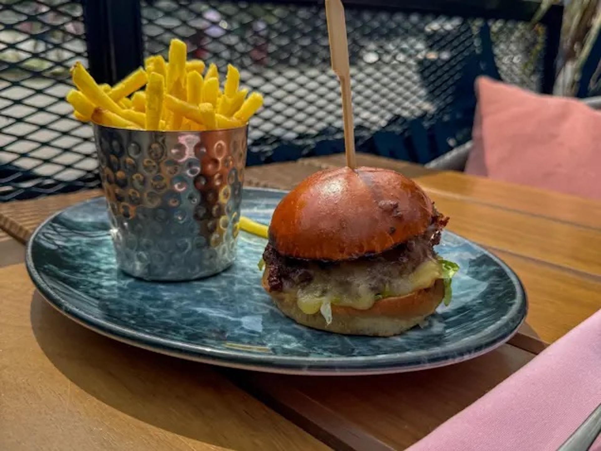Burger and chips on a table from Burger &amp;amp; Lobster