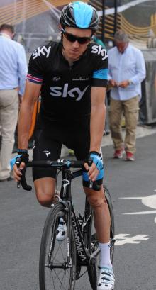 Geraint Thomas of Sky looked uncomfortable as he crossed the finish line