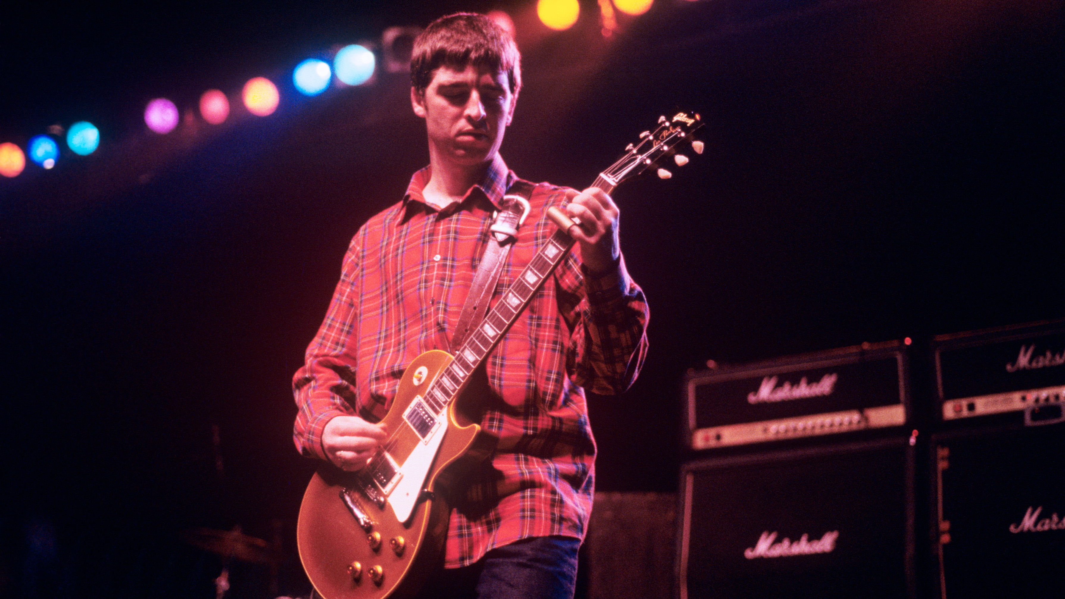 Noel Gallagher performing with Oasis at The Academy in New York City on March 8, 1995