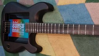 electric guitar with iPad under strings