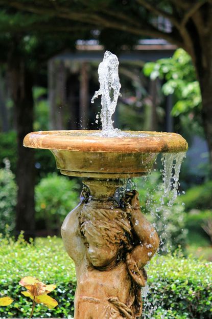 Water Fountain Feature In The Garden