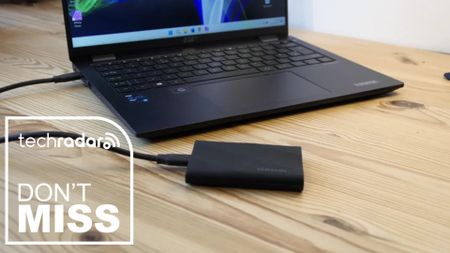 The Samsung T9 in a home office during our review, next to a TechRadar badge that reads 'Don't Miss'