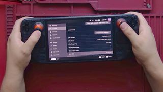 Screenshot of SlickBuys Mods and Repairs Steam Deck OLED 32GB RAM upgrade video with hands holding modded handheld.