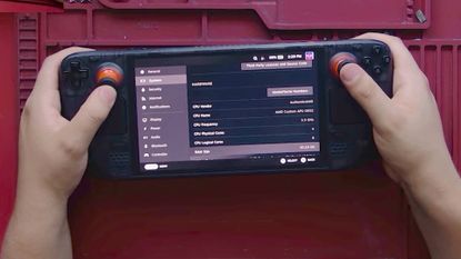 Screenshot of SlickBuys Mods and Repairs Steam Deck OLED 32GB RAM upgrade video with hands holding modded handheld.