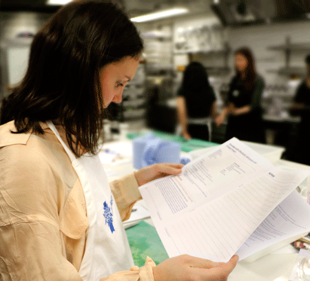 Decanter&rsquo;s Jessica Charlton double checking the recipe from Great British Chefs