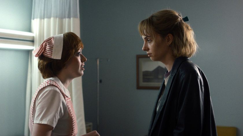 Amybeth McNulty as Vickie and Maya Hawke as Robin stand facing each other on Stranger Things Season 5.